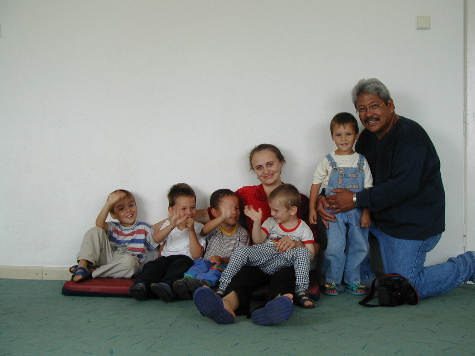 Frank Mendiola with children in the play room at Bistritia.